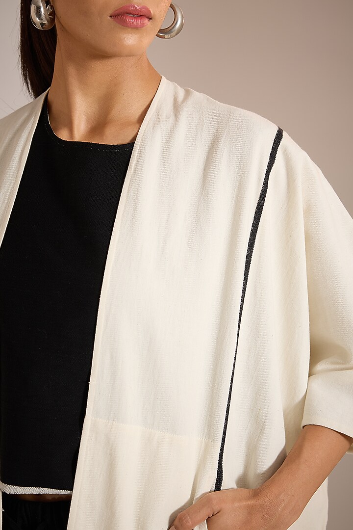 White Handloom Denim Block Printed Paneled Jacket by Urvashi Kaur at Pernia's Pop Up Shop