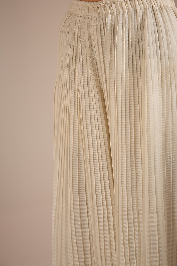 Ecru Handloom Chanderi Silk Pleated Pants by Urvashi Kaur at Pernia's Pop Up Shop