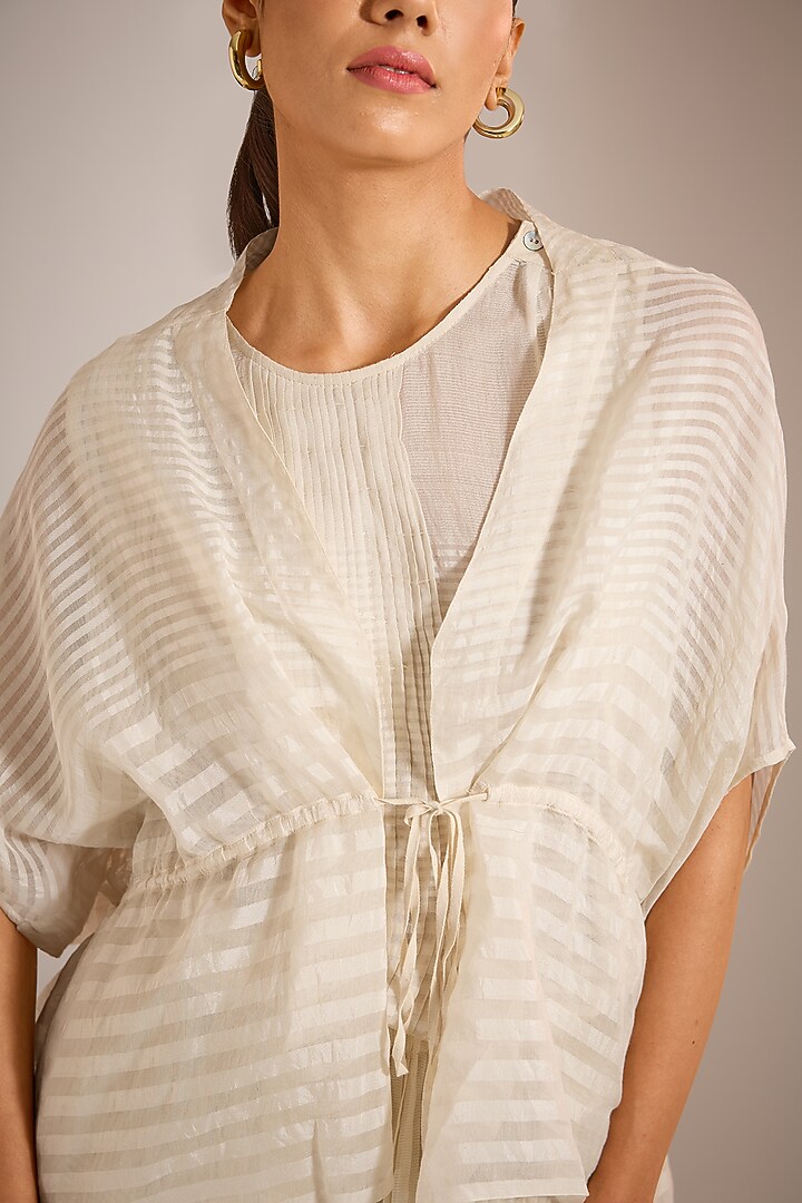 Ecru Handwoven Chanderi Silk Tie-Up Gathered Jacket by Urvashi Kaur at Pernia's Pop Up Shop