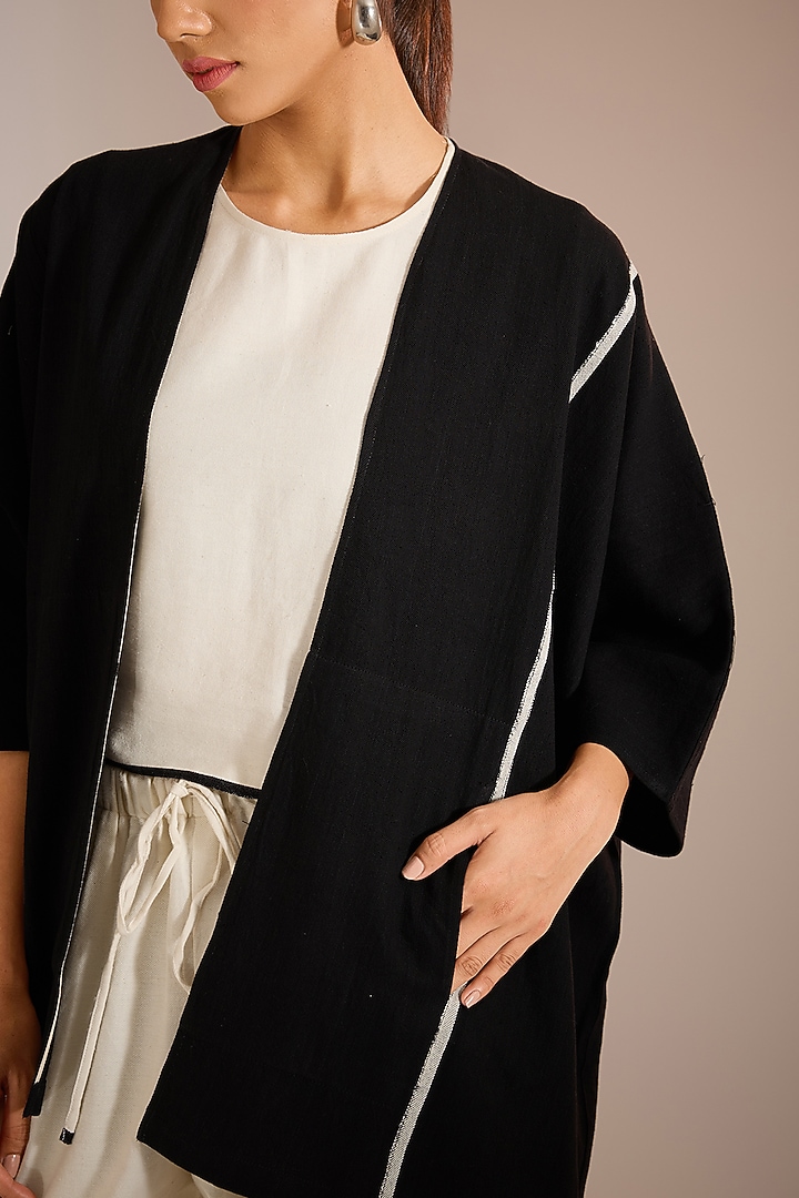 Black Handloom Denim Block Printed Overlay Jacket by Urvashi Kaur at Pernia's Pop Up Shop
