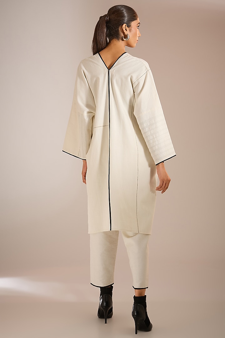 White Handloom Denim Straight Pants by Urvashi Kaur at Pernia's Pop Up Shop