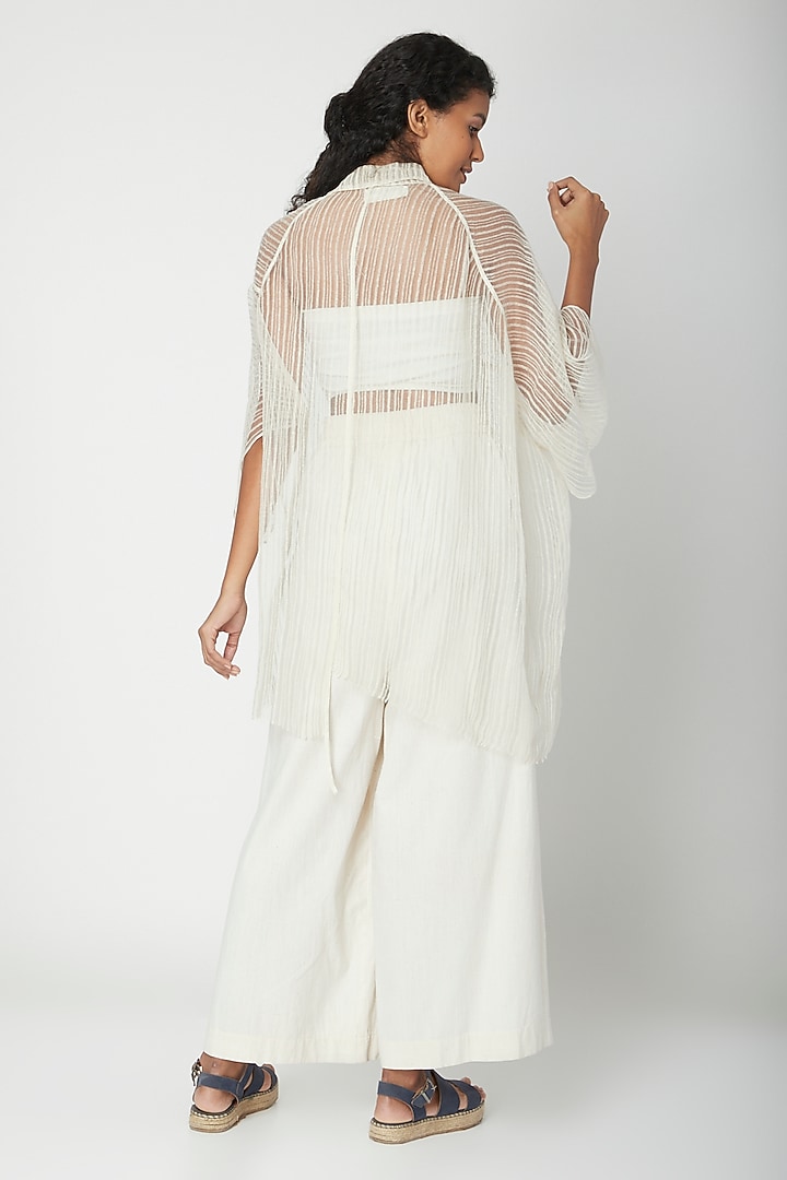 Ecru White Flared Pants by Urvashi Kaur at Pernia's Pop Up Shop