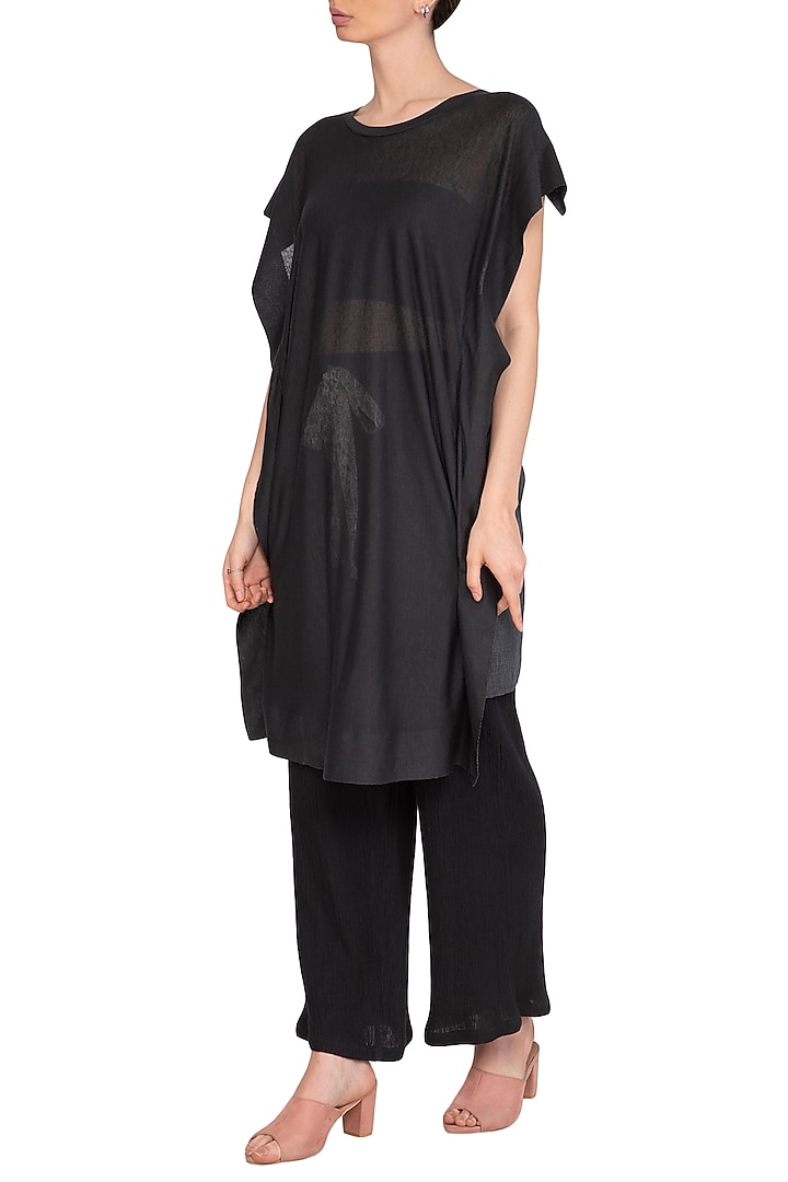 Black Textured Slouchy Pants by Urvashi Kaur at Pernia's Pop Up Shop