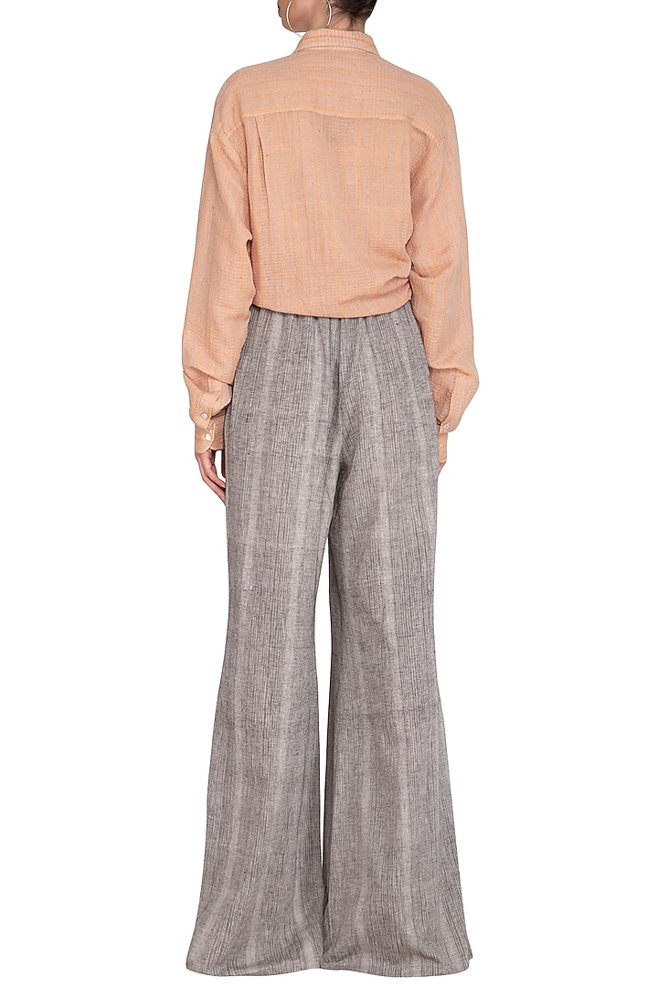 Grey Organic Cotton Flared Pants by Urvashi Kaur at Pernia's Pop Up Shop
