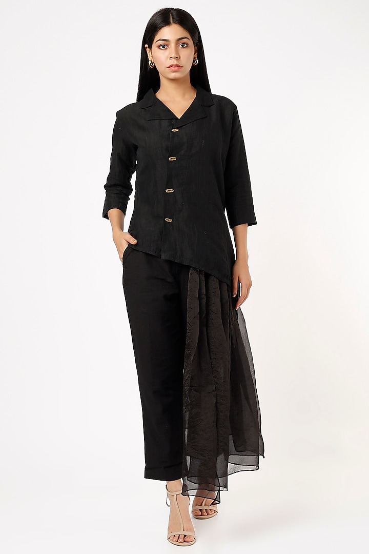 Black Asymmetrical Top With Attached Plated Belt Skirt by VAANI BESWAL