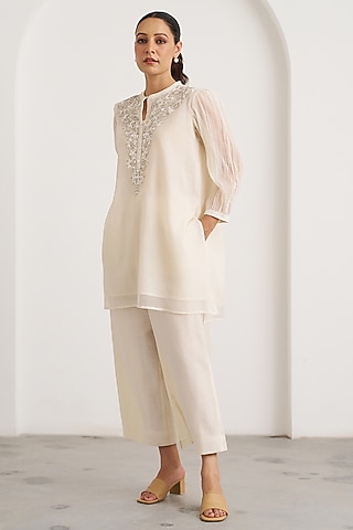 Pearl White Mul Chanderi Handwork Top by Vaaya