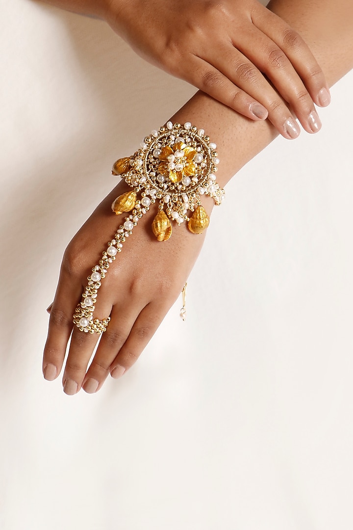 Gold Plated Shell & Pearl Haathphool by Vaidaan Jewellery at Pernia's Pop Up Shop