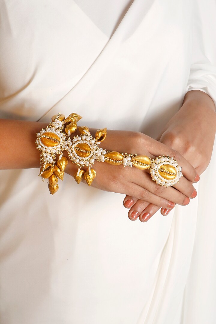 Gold Plated Shell & Pearl Haathphool by Vaidaan Jewellery at Pernia's Pop Up Shop