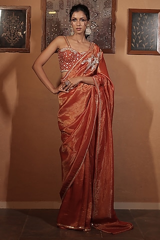 Rust Tissue Floral Embroidered Saree Set by vana ethnics