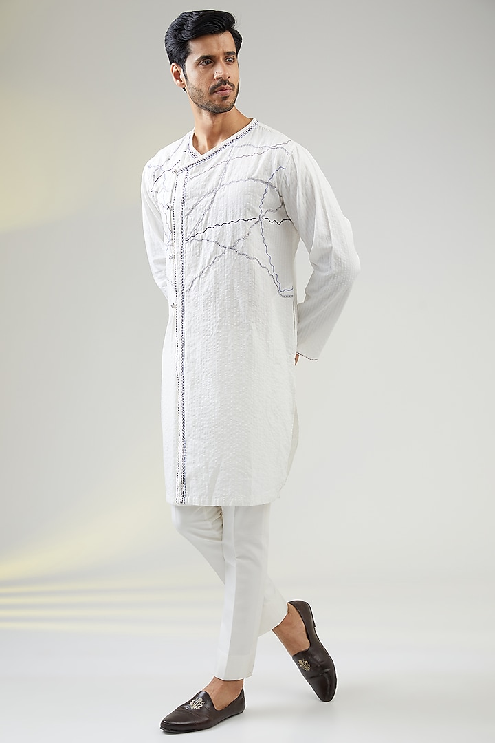 Ivory Seersucker Kantha Embroidered Asymmetric Kurta by VAANI BESWAL MEN at Pernia's Pop Up Shop