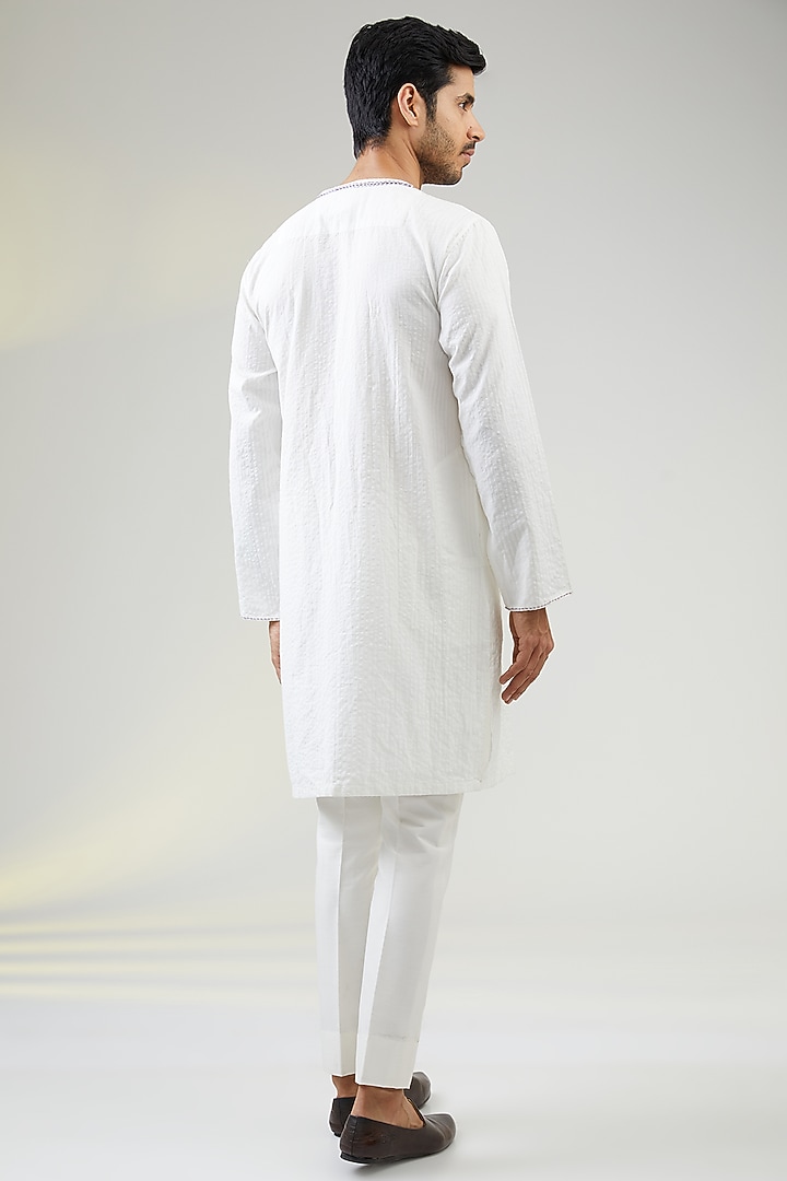 Ivory Seersucker Kantha Embroidered Asymmetric Kurta by VAANI BESWAL MEN at Pernia's Pop Up Shop