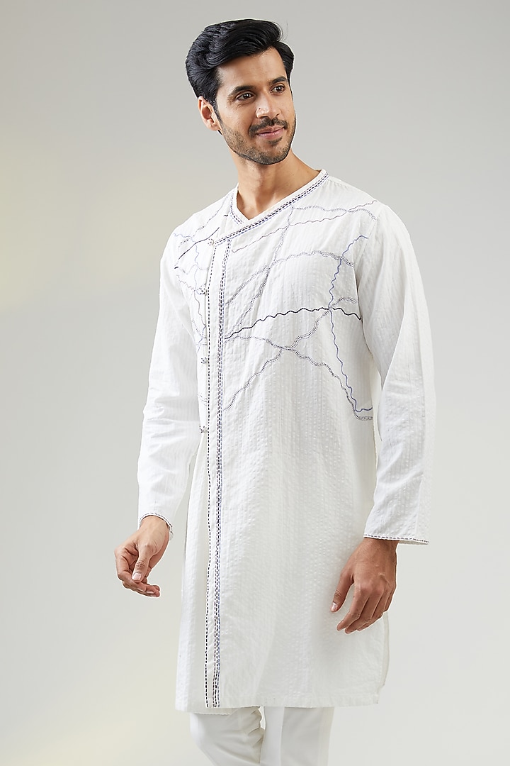 Ivory Seersucker Kantha Embroidered Asymmetric Kurta by VAANI BESWAL MEN at Pernia's Pop Up Shop