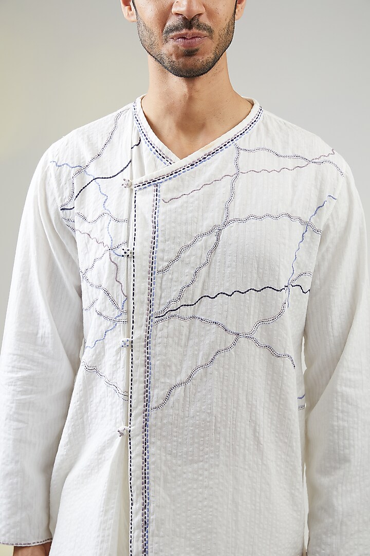 Ivory Seersucker Kantha Embroidered Asymmetric Kurta by VAANI BESWAL MEN at Pernia's Pop Up Shop