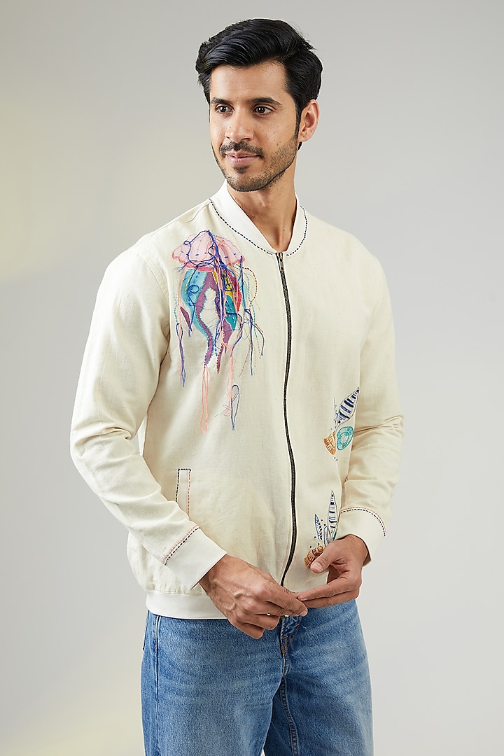 Ivory Handwoven Cotton Linen Printed & Embroidered Bomber Jacket by VAANI BESWAL MEN at Pernia's Pop Up Shop