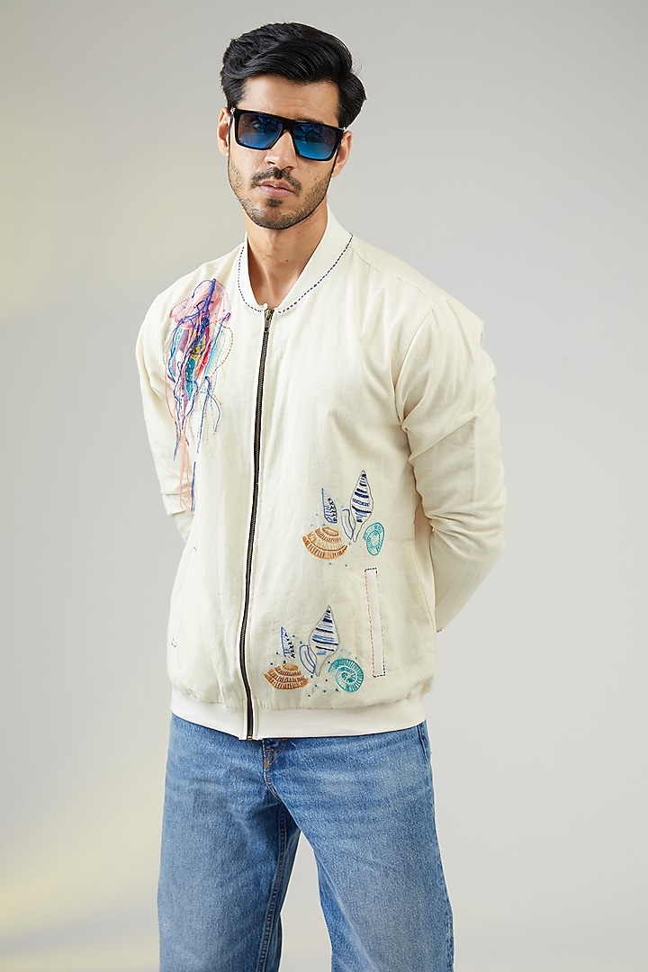 Ivory Handwoven Cotton Linen Printed & Embroidered Bomber Jacket by VAANI BESWAL MEN at Pernia's Pop Up Shop