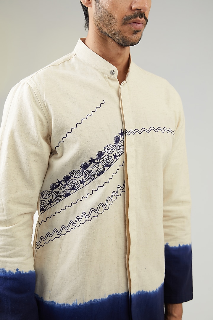 Ivory Handwoven Cotton Khadi Hand Embroidered Asymmetric Kurta by VAANI BESWAL MEN at Pernia's Pop Up Shop