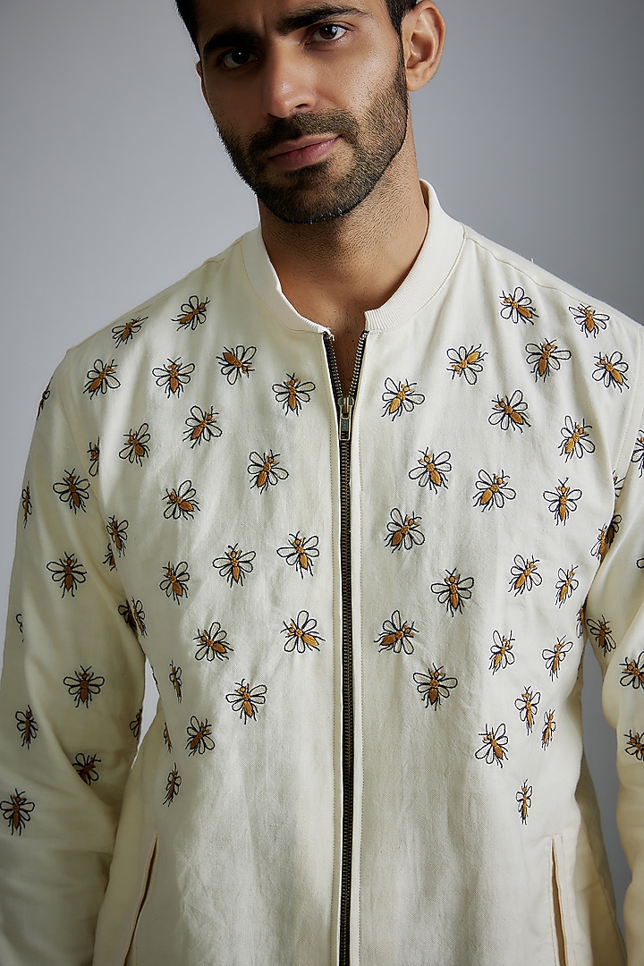 Ivory Handwoven Cotton Embroidered Bomber Jacket by VAANI BESWAL MEN at Pernia's Pop Up Shop