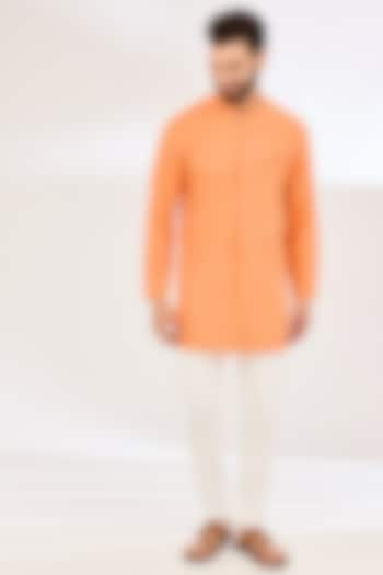 Orange Seersucker Pleated Kurta by VAANI BESWAL MEN