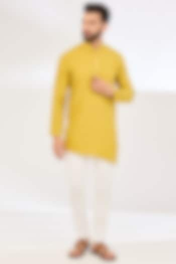 Yellow Mulberry Silk Asymmetric Kurta by VAANI BESWAL MEN