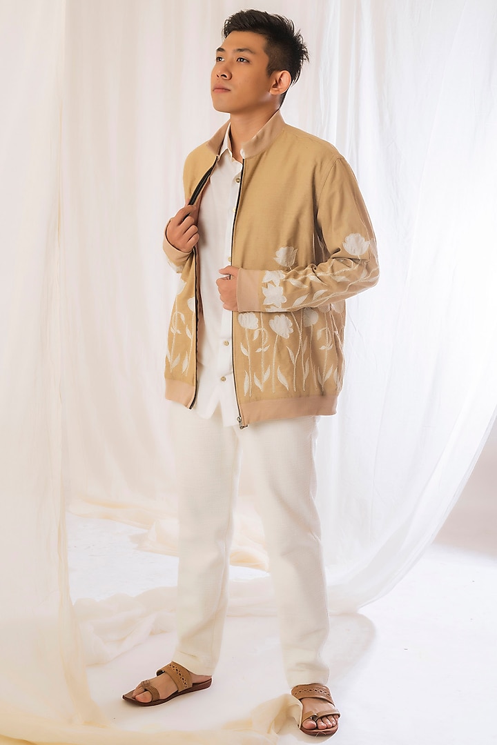 Beige Embroidered Bomber Jacket by VAANI BESWAL MEN