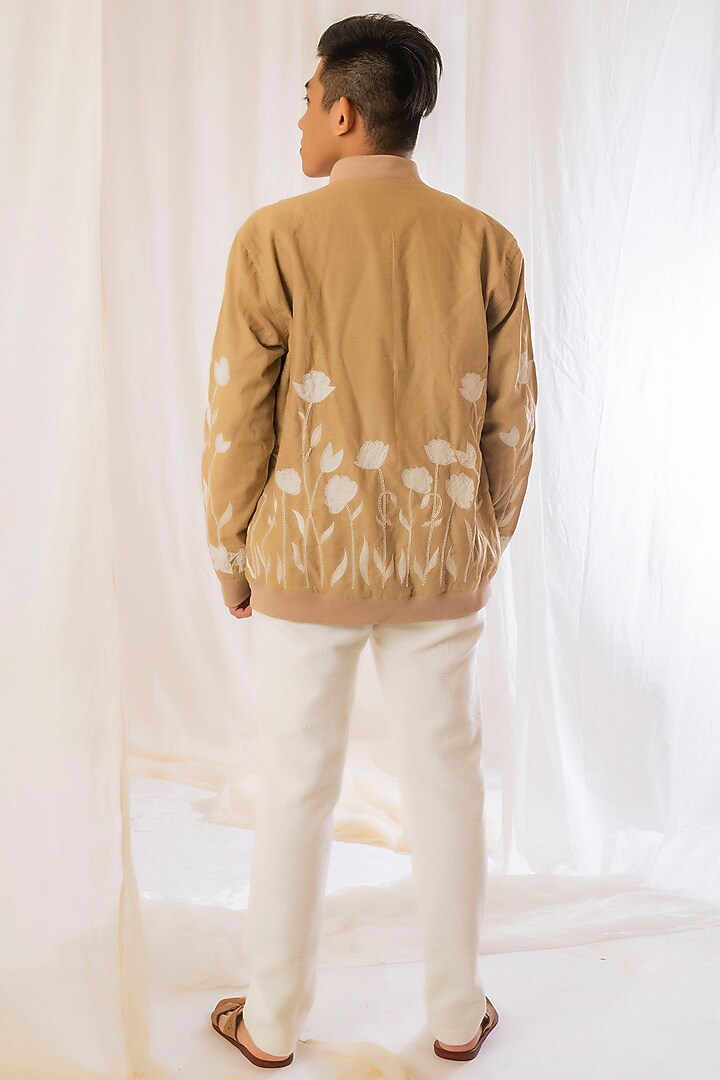Beige Embroidered Bomber Jacket by VAANI BESWAL MEN at Pernia's Pop Up Shop