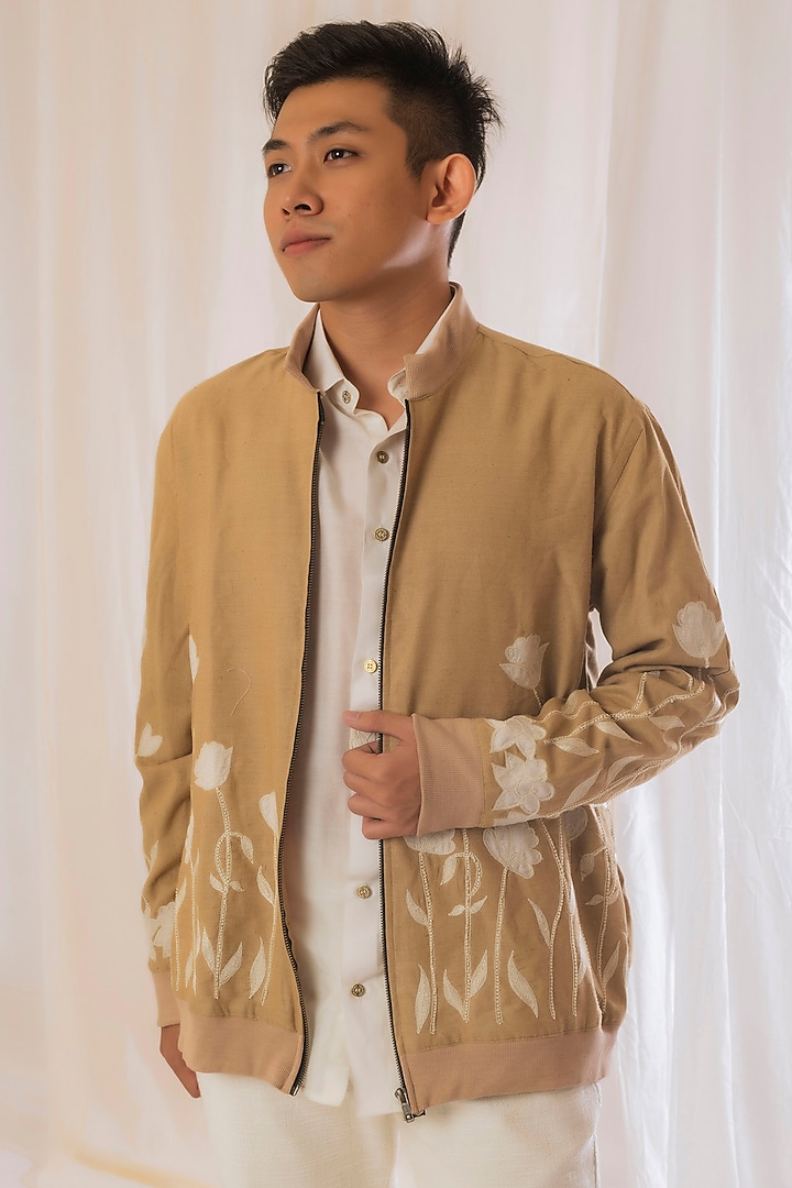Beige Embroidered Bomber Jacket by VAANI BESWAL MEN at Pernia's Pop Up Shop