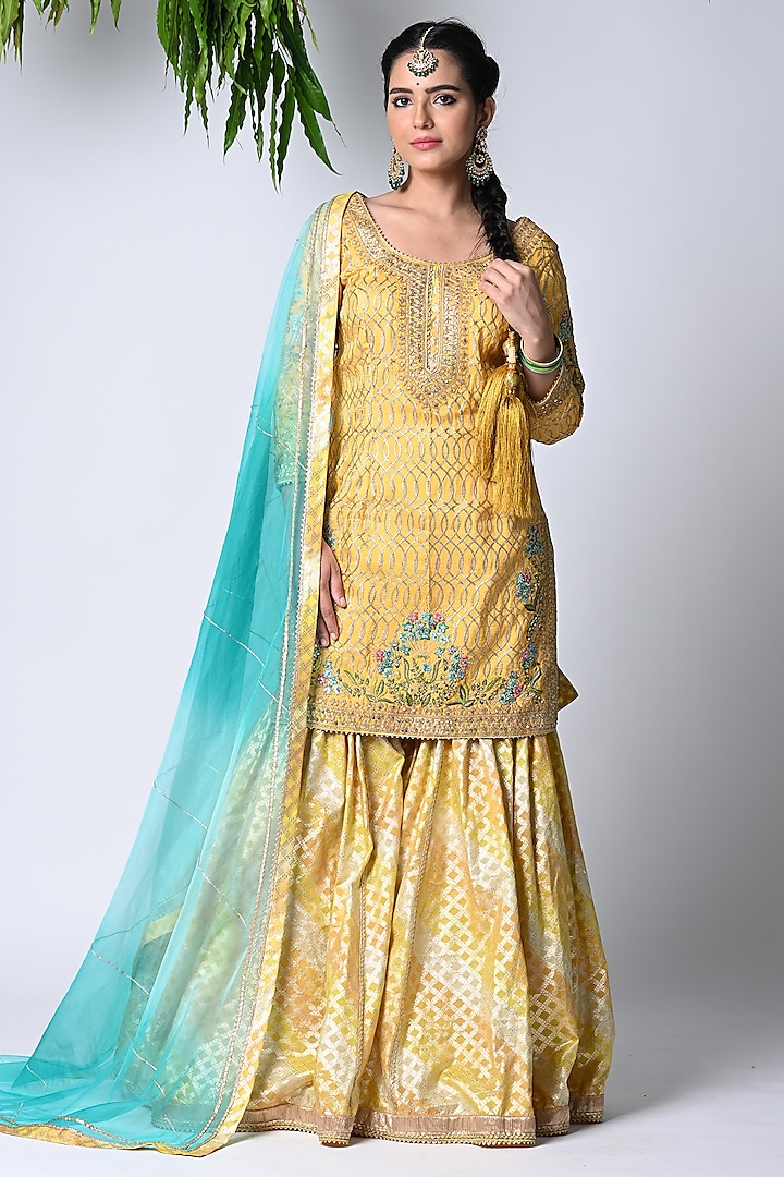 Mustard Banarasi Embroidered Sharara Set by Vannikaa Malik