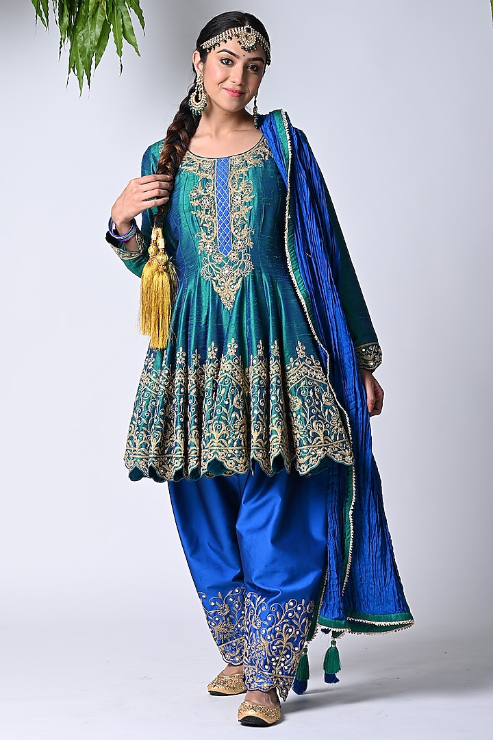 Blue Dupion Silk Machine Embroidered Anarkali Set by Vannikaa Malik