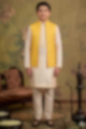 Yellow Silk Embroidered Bundi Jacket Set For Boys by Vanshik Kids at Pernia's Pop Up Shop