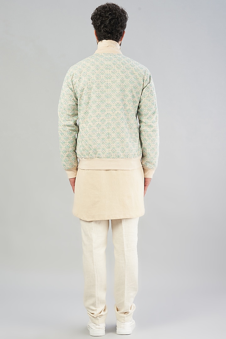Off-White Embroidered Bomber Jacket by VARENYA at Pernia's Pop Up Shop