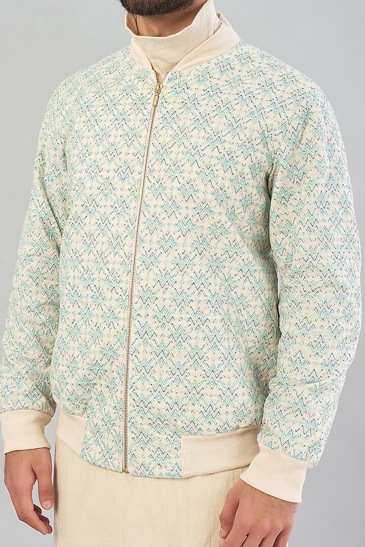 Off-White Embroidered Bomber Jacket by VARENYA at Pernia's Pop Up Shop