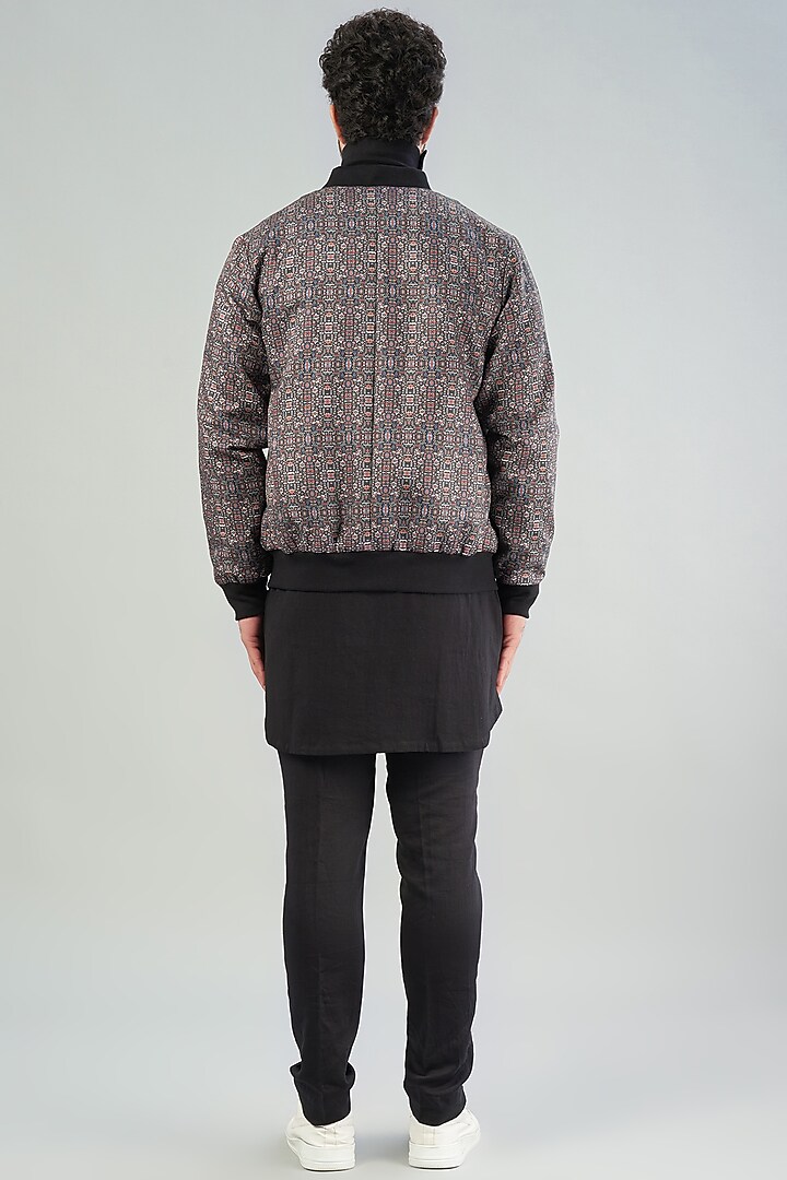 Black Printed Bomber Jacket by VARENYA at Pernia's Pop Up Shop