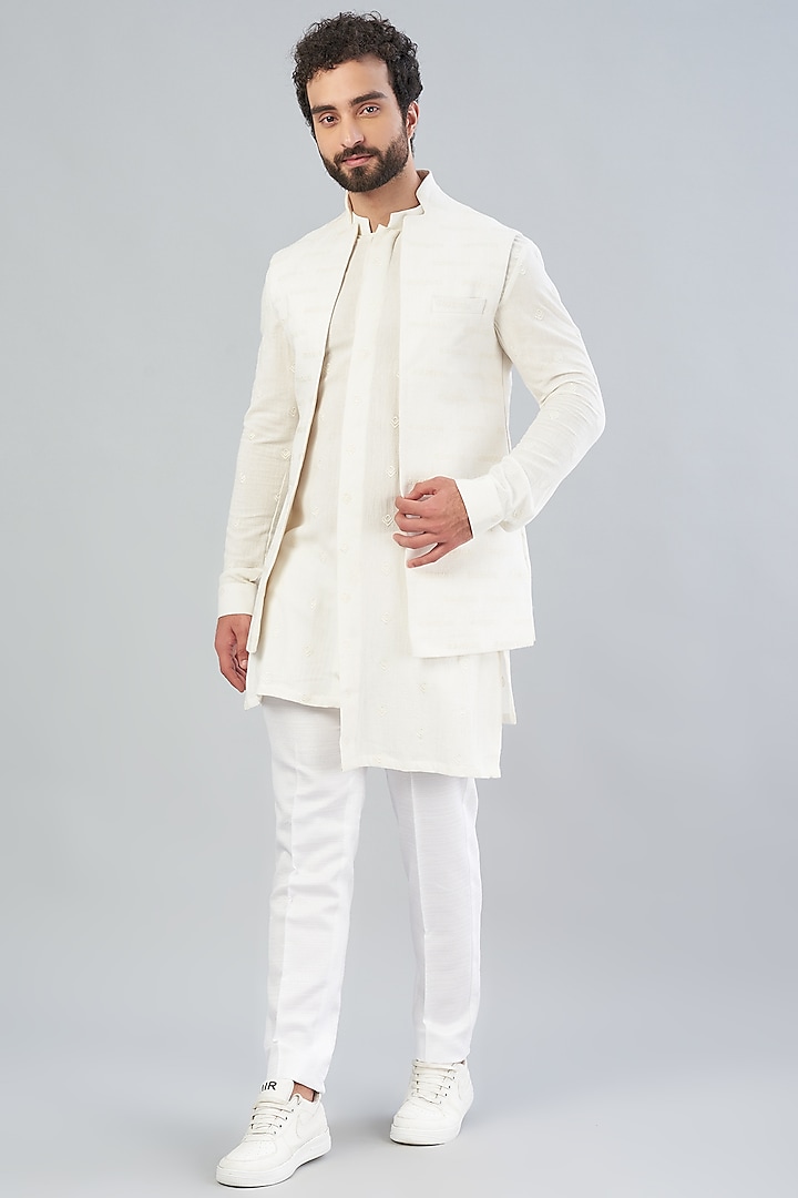 White Embroidered Nehru Jacket With Kurta Set by VARENYA