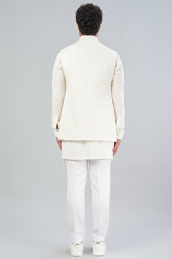 White Embroidered Nehru Jacket With Kurta Set by VARENYA at Pernia's Pop Up Shop