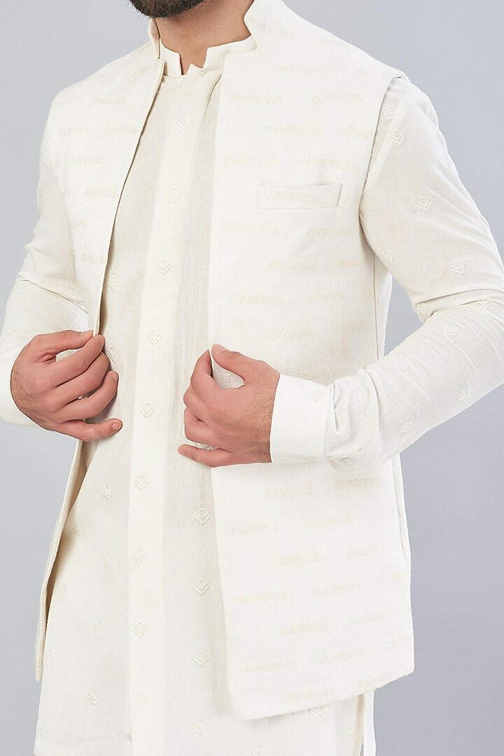 White Embroidered Nehru Jacket With Kurta Set by VARENYA at Pernia's Pop Up Shop