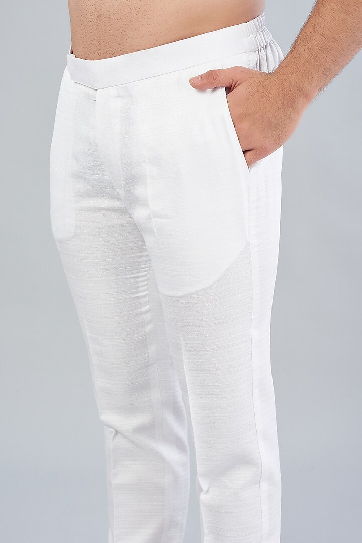 White Embroidered Nehru Jacket With Kurta Set by VARENYA at Pernia's Pop Up Shop