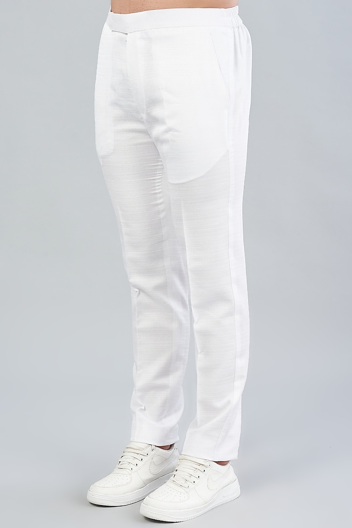 White Embroidered Nehru Jacket With Kurta Set by VARENYA at Pernia's Pop Up Shop