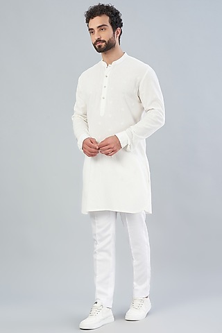 White Cotton Embroidered
Kurta Set by VARENYA