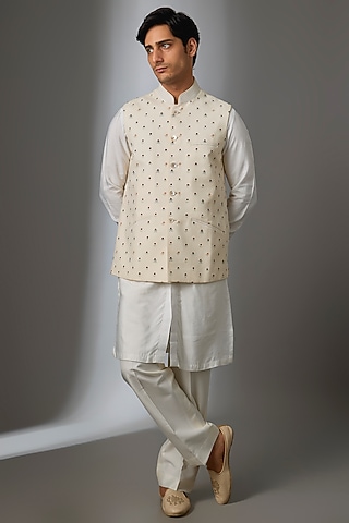 Cream Silk Bundi Jacket Set by VAROIN MARWAH