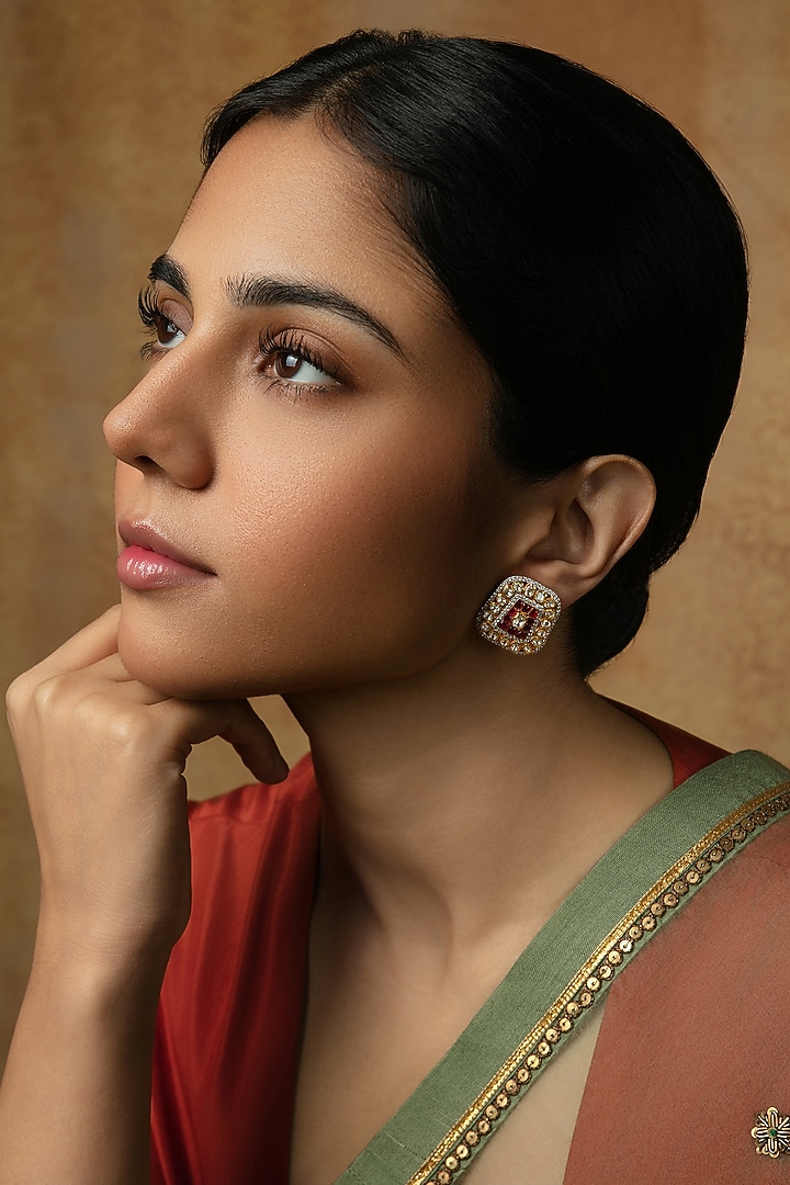 Gold Plated Moissanite Polki & Ruby Stud Earrings In Sterling Silver by Varq Jewels at Pernia's Pop Up Shop