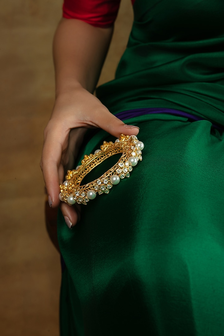 Gold Plated Moissanite Stone & Pearl Kada In Sterling Silver by Varq Jewels at Pernia's Pop Up Shop