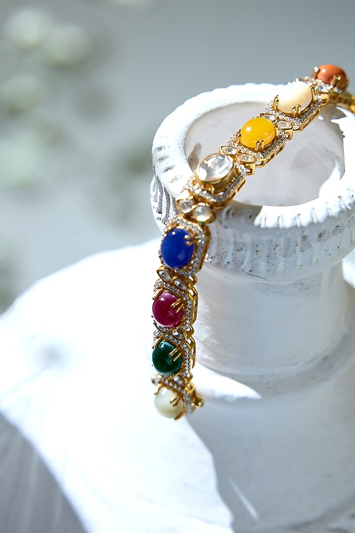 Gold Finish Navratna Gemstone Bracelet In Sterling Silver by Varq Jewels at Pernia's Pop Up Shop