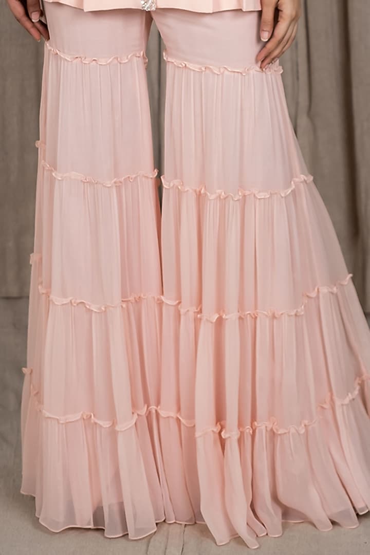 Pastel Peach Tiered Wedding Sharara Set by Varsana Boutique at Pernia's Pop Up Shop