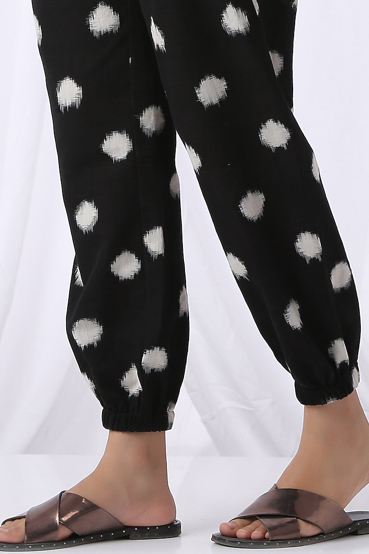 Black & Off-White Polka Printed Jogger Pants by Vasstram at Pernia's Pop Up Shop