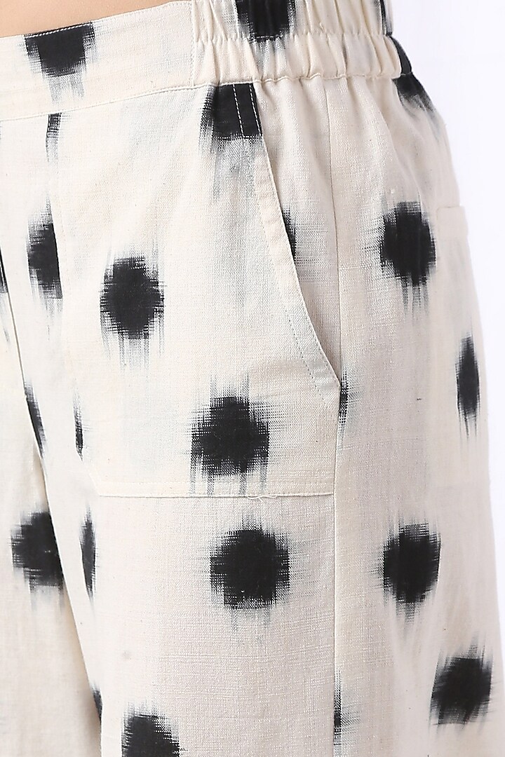 Off-White & Black Printed Pants by Vasstram at Pernia's Pop Up Shop