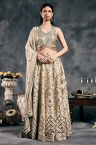 Ivory Shimmer Raw Silk Mirror Work Lehenga Set by Vandana Sethi