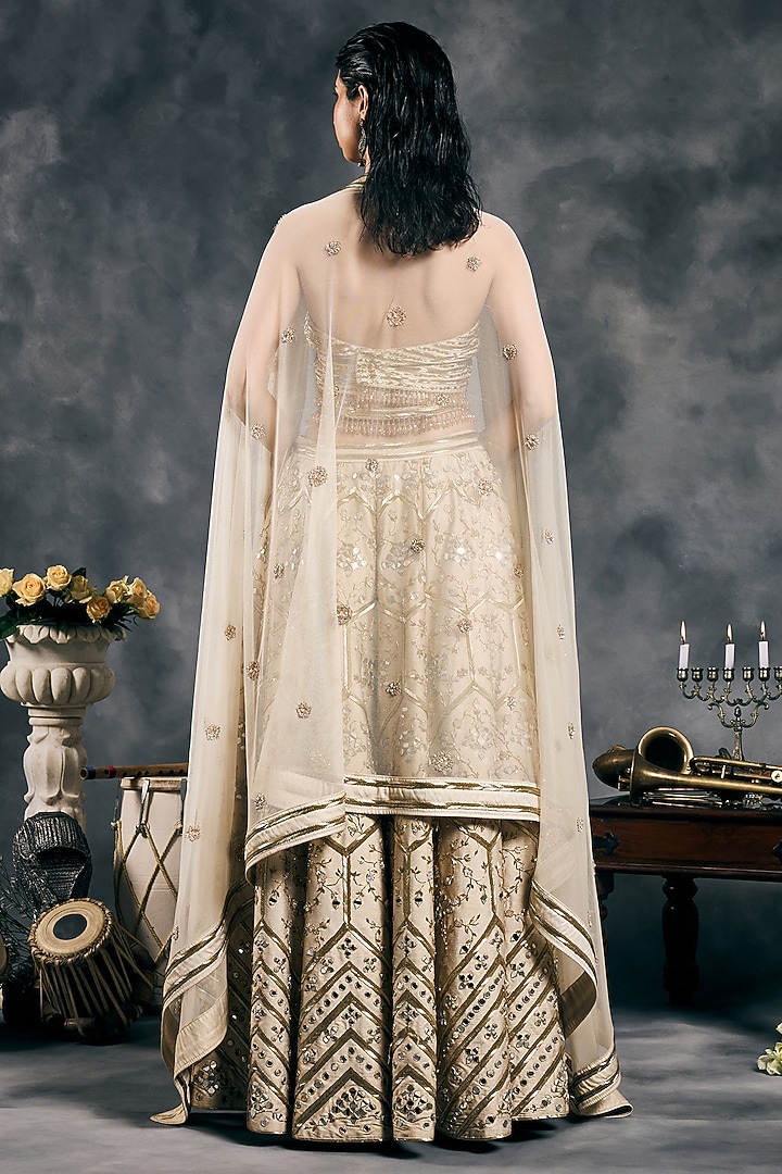 Ivory Shimmer Raw Silk Mirror Work Bridal Lehenga Set by Vandana Sethi at Pernia's Pop Up Shop
