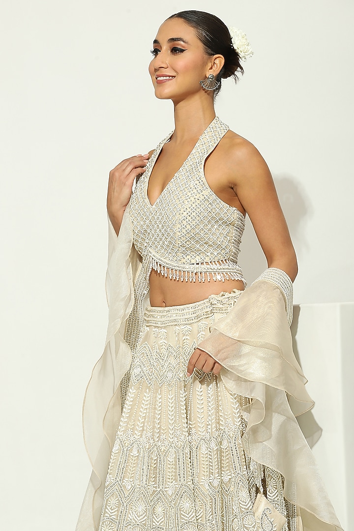 Ivory Shimmer Organza Mirror & Zircons Embellished Bridal Lehenga Set by Vandana Sethi at Pernia's Pop Up Shop