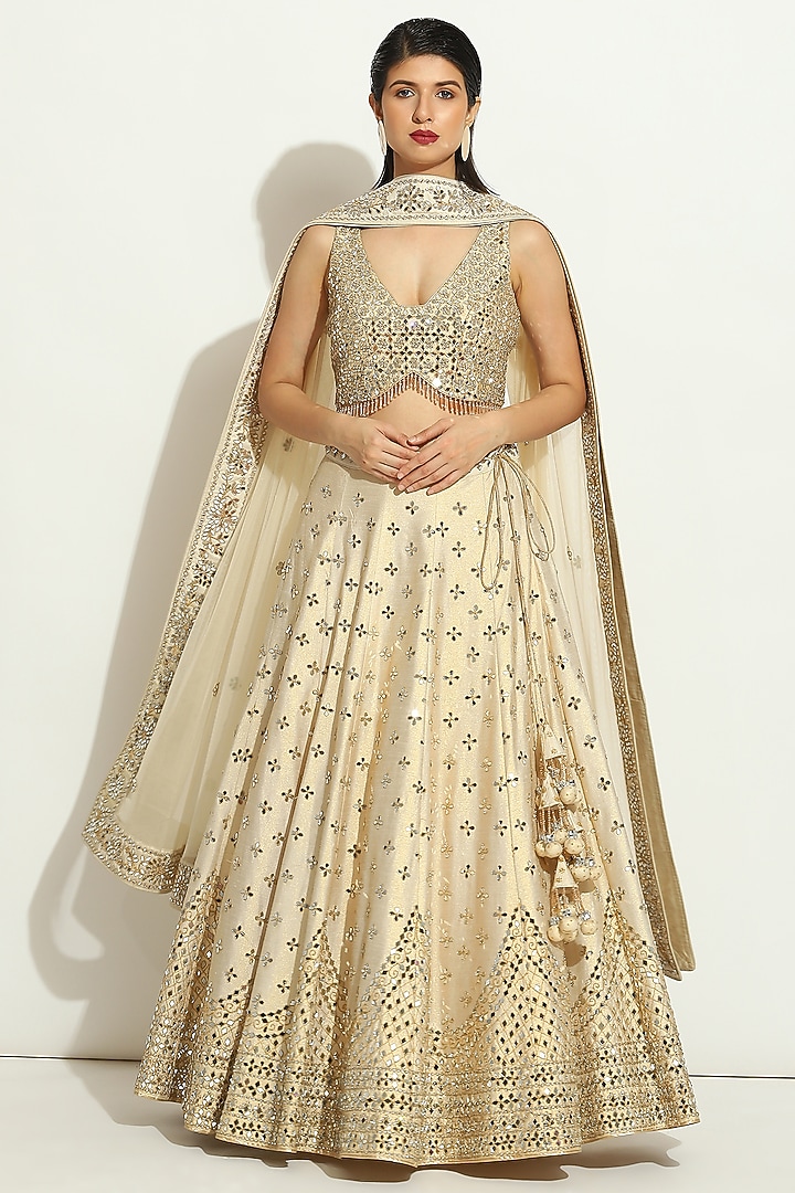 Ivory Shimmer Raw Silk MIrror Embroidered Bridal Lehenga Set by Vandana Sethi at Pernia's Pop Up Shop