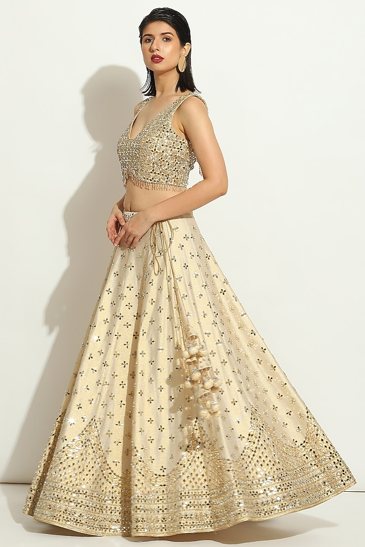 Ivory Shimmer Raw Silk MIrror Embroidered Bridal Lehenga Set by Vandana Sethi at Pernia's Pop Up Shop